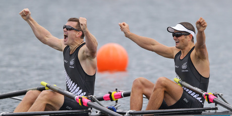 Nathan Cohen and Joeseph Sullivan celebrate after crossing the line to win Olympic gold. Photo / Brett Phibbs