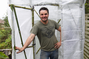 Free bamboo provides a sturdy framework for Justin's propagation house. Photo / Richard Robinson