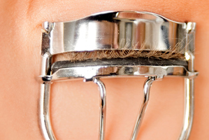 Simply using an eyelash curler before applying mascara will make your lashes look longer. Photo / Thinkstock