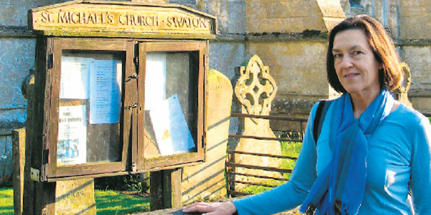 Susan Buckland stands outside St Michael's Church in Swaton, Lincolnshire, where her great grandfather Vincent Allen once worshipped. Photo / Supplied
