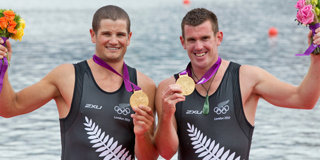 New Zealand double sculls pair of Joseph Sullivan and Nathan Cohen with their gold medals. Source / Brett Phibbs NZ Herald