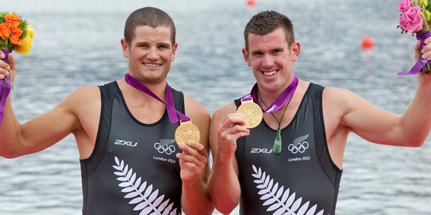 New Zealand double sculls pair of Joseph Sullivan and Nathan Cohen with their gold medals. Source / Brett Phibbs NZ Herald