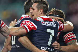 The Sydney Roosters celebrate a try during their win over the Dragons. Source / Getty Images