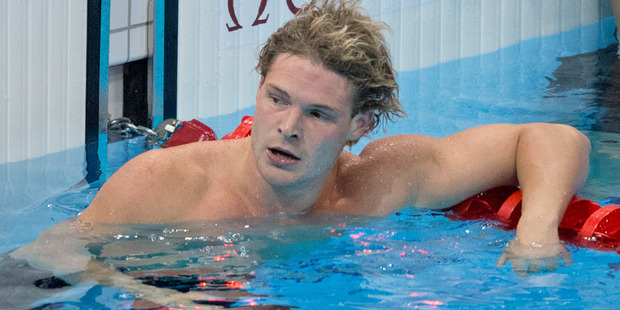 Glenn Snyders reacts after missing out on the men's 100m breaststroke final. Photo / Brett Phibbs