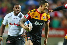 Sonny Bill Williams makes a break during the Chiefs' Super Rugby final win over the Sharks in Hamilton. Source / Getty Images