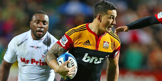 Sonny Bill Williams makes a break during the Chiefs' Super Rugby final win over the Sharks in Hamilton. Source / Getty Images