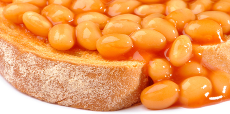 Biting into warm, crispy toast generously topped with baked beans: the perfect way to fuel up. Photo / Thinkstock