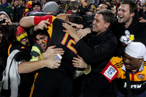 An enthusiastic reception for Sonny Bill Williams as he runs into the crowd after scoring the Chiefs' final try in their 37-6 victory over the Sharks in the Super rugby final in Hamilton. Photo / Alan Gibson