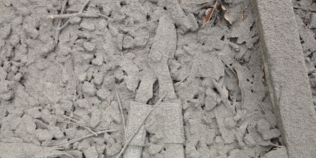 Ash covered ground after Mt Tongariro erupted late on Monday night. Photo / Alan Gibson