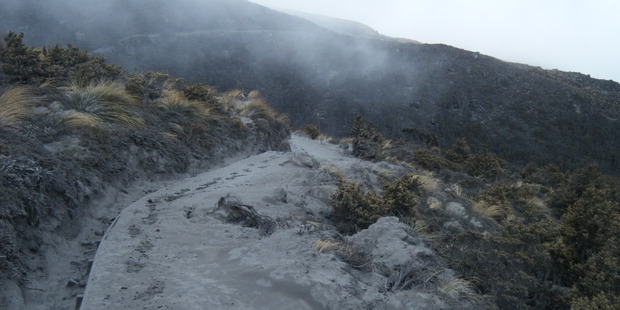 Ash covers a walkway on the Tongariro crossing. Photo / Supplied