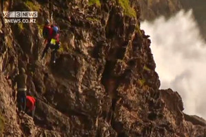 The Spotswood College students on Paritutu Rock yesterday afternoon. Two of their number and instructor were last night missing despite intensive searches. Photo / 3News