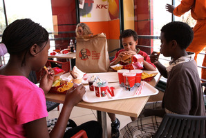 The arrival of KFC in Nairobi has been regarded as a milestone in the rise of Kenya's middle classes rather than a cause for health concern. Photo / AP