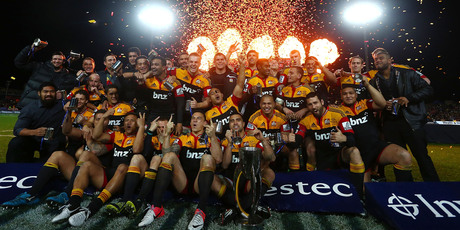 Chiefs players celebrate their Super Rugby victory last night. Photo / Getty Images