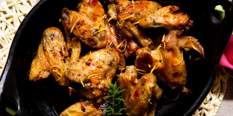 Lemon and rosemary roasted chicken wings. Photo / Babiche Martens