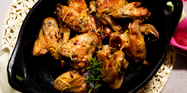 Lemon and rosemary roasted chicken wings. Photo / Babiche Martens