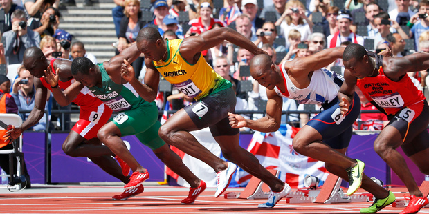 Jamaica's Usain Bolt (wearing yellow) in a 100m heat at the Olympics. Photo / AP