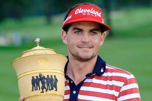 Keegan Bradley holds the trophy after winning the Bridgestone Invitational. Photo / AP