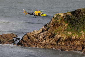 Three students fell from Paritutu Rock and an instructor dived in to save them. Photo / Christine Cornege