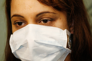 If caught in volcanic ash falls: Wear a dust mask or use a handkerchief or cloth over your nose and mouth. Photo / NZ Herald
