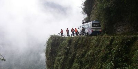 The bike tour takes you through the challenging Death Road where you encounter blind corners and 'murder muffin' rocks. Photo / www.gravitybolivia.com
