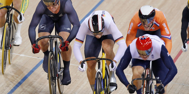New Zealand's Simon van Velthooven crosses the line in a dead-heat with Teyn Mulder, Netherlands, for the bronze medal. Photo / Mark Mitchell