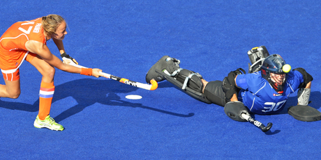 Black Sticks goalkeeper Bianca Russell saves a shot from Netherlands Maartje Paumen during their semifinal penalty shootout. Photo / Brett Phibbs