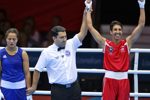 New Zealand women's boxer Alexis Pritchard gets the win, after the bout against Rim Jouini of Tunisia. Photo / Brett Phibbs