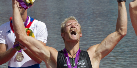New Zealand rower Eric Murray during the medal ceremony after winning Gold in the Final of the Men's Pair. Photo / Brett Phibbs.