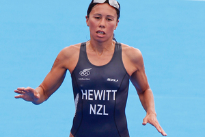The fast pace in the run took its toll on New Zealand's Andrea Hewitt who came sixth in the triathlon. Photo / Mark Mitchell