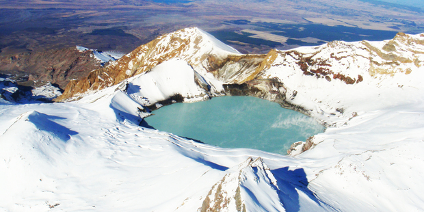 Mt Ruapehu's crater lake stands out like a jewel. Photo / Jared Savage