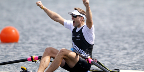 Mahe Drysdale celebrates gold in the single sculls. Photo / Brett Phibbs