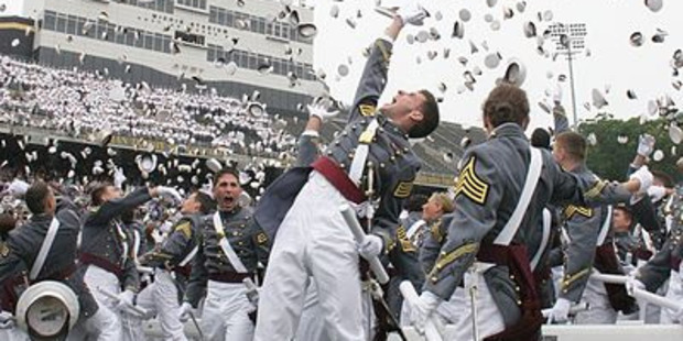 At graduation, tried-and-tested cadets toss their hats in the air.