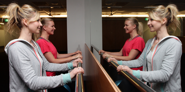 Rachel Grunwell (left) and Casey Green take their positions for some ballet-inspired barre work. Photo / Doug Sherring