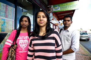Students (from left) Josalin Devi, Zaina Nisha, and Umesh Sami outside the now-closed Ellipse Institute. Photo / Dean Purcell