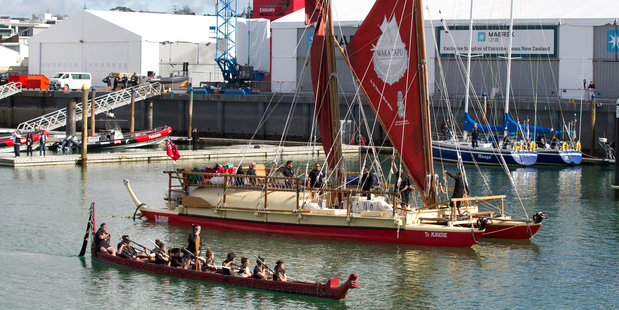 People celebrate the departure of Waka Tapu, from the Viaduct Events Centre, Auckland. Photo / Steven McNicholl