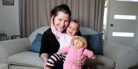 Jennifer Jamie has handed her doll to her daughter Amaya. Photo / Michael Craig