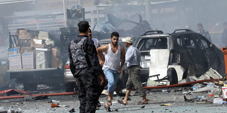 The scene of a car bomb explosion in Baghdad. Photo / AP