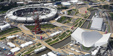 The London 2012 Olympic Park. The Olympic stadium and Accor Mittal 'Orbit' Tower (left), and the Aquatic Centre and Water Polo pool (right). Photo / AP