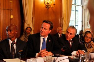 Double Olympic champion Mo Farah, Britain's Prime Minister David Cameron and Vice-President of Brazil Michel Temer. Photo / AP