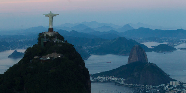 Today Rio de Janeiro picks up the baton with its famous landmarks as Brazil's second largest city receives the Olympic flame. Photo / AP