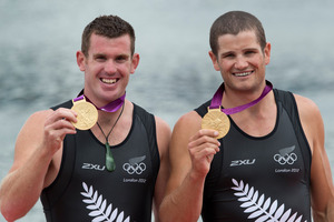 New Zealand Double Scull pair of Nathan Cohen and Joseph Sullivan with their Gold Medals. Photo / Brett Phibbs