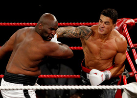 Sonny Bill Williams fights against Clarence Tillman III in Hamilton. Photo / Christine Cornege