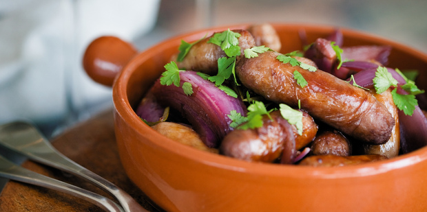 Sausages in red wine. Photo / NZ Listener
