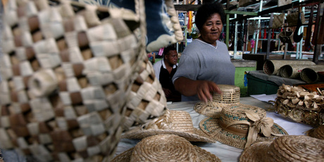 Hats, and much more, are on sale at the Apia flea market. Photo / Dean Purcell