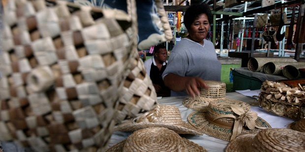 Hats, and much more, are on sale at the Apia flea market. Photo / Dean Purcell