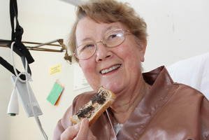 Solveig Sheed having Marmite on toast for breakfast at Nelson Hospital. Photo / Andrew Board