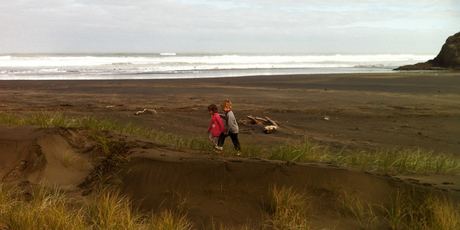 Danielle Wright's children explore uninterrupted on an empty Anawhata Beach. Photo / Supplied