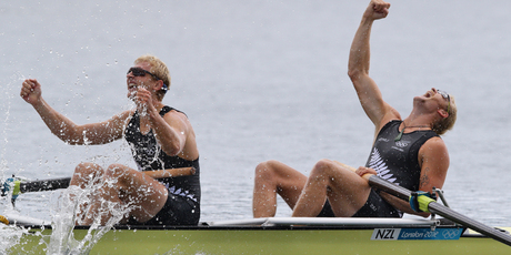 Hamish Bond and Eric Murray celebrate after winning gold in the final of the men's pair. Photo / Brett Phibbs