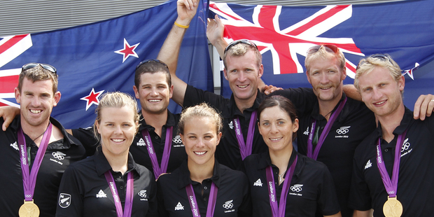 New Zealand's gold medalists, from left, back, Joseph Sullivan, Nathan Cohen, Mahe Drysdale, Eric Murray and Hamish Bond, front, Olivia Powrie, Lisa Carrington and Jo Aleh. Photo / Mark Mitchell