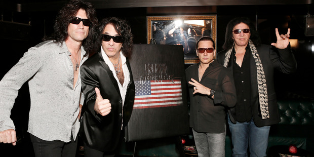 Tommy Thayer, Paul Stanley, Eric Singer and Gene Simmons from Kiss attend the Kiss Monster Book launch at the Viper Room in West Hollywood. Photo / AP
